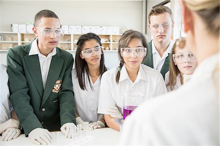 simsearch:614-02984826,k - Students listening to teacher in lab Stock Photo - Premium Royalty-Free, Code: 614-08878744