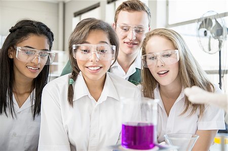 experimenting - Students conducting experiment in lab Stock Photo - Premium Royalty-Free, Code: 614-08878745