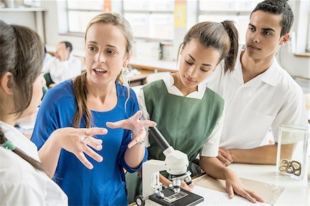 simsearch:614-06973669,k - Students listening to teacher in lab Stock Photo - Premium Royalty-Free, Code: 614-08878769