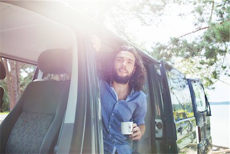 simsearch:614-09078761,k - Young man having coffee in van by lake Stock Photo - Premium Royalty-Free, Code: 614-08878955