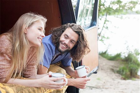 simsearch:614-09078761,k - Young couple relaxing in van by lake Stock Photo - Premium Royalty-Free, Code: 614-08878962