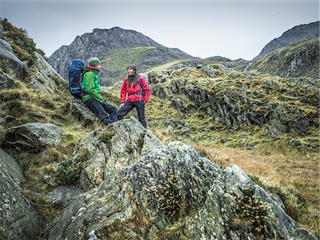 Couple hiking in rocky landscape Stock Photo - Premium Royalty-Free, Code: 614-08870367