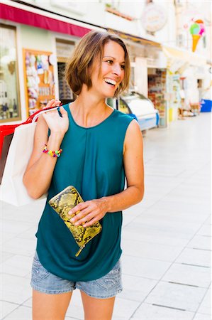 simsearch:614-06896739,k - Woman carrying shopping bags Stock Photo - Premium Royalty-Free, Code: 614-08870547