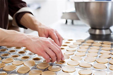 simsearch:649-06165027,k - Baker shaping pastry in kitchen Stock Photo - Premium Royalty-Free, Code: 614-08871076