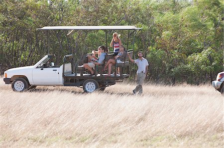 simsearch:6108-06906290,k - Young people on safari in off road vehicle, Stellenbosch, South Africa Stock Photo - Premium Royalty-Free, Code: 614-08871522