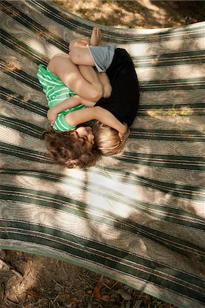 simsearch:640-06963757,k - Two children lying on hammock Stock Photo - Premium Royalty-Free, Code: 614-08872132