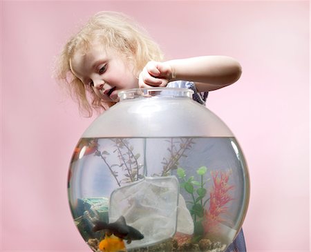 simsearch:6122-07698204,k - Young girl with fishing net and goldfish bowl Stock Photo - Premium Royalty-Free, Code: 614-08872518
