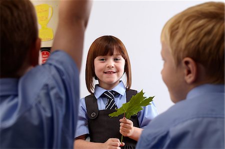 simsearch:614-06116419,k - School girl doing a presentation to other classmates Stock Photo - Premium Royalty-Free, Code: 614-08872856