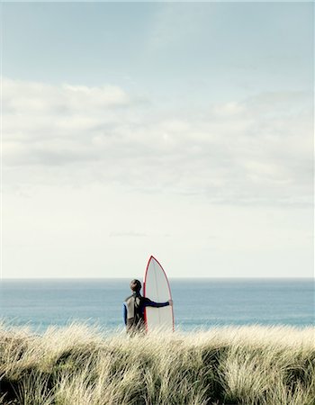 simsearch:614-05557077,k - Surfer looking out to sea Stock Photo - Premium Royalty-Free, Code: 614-08873210