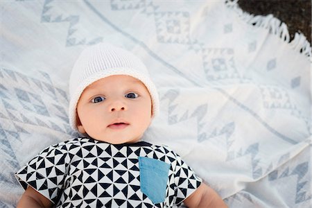 simsearch:614-07031850,k - Portrait of baby boy lying on blanket, overhead view Stock Photo - Premium Royalty-Free, Code: 614-08884822