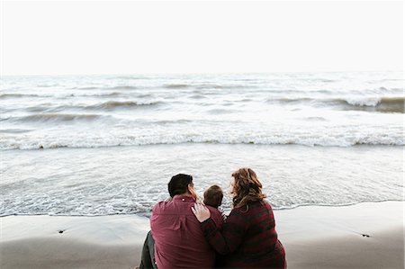 simsearch:700-01582158,k - Rear view of mother and father sitting on beach Stock Photo - Premium Royalty-Free, Code: 614-08880813