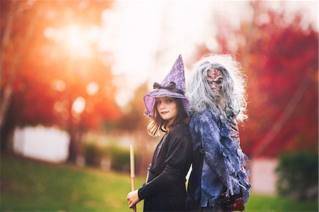 Friends dressed as witch and zombie Stock Photo - Premium Royalty-Free, Code: 614-08880871