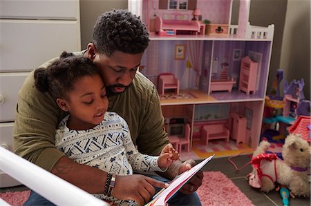 simsearch:614-06623416,k - Father reading to daughter Stock Photo - Premium Royalty-Free, Code: 614-08881218