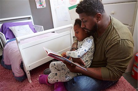 simsearch:614-06623416,k - Father reading to daughter Stock Photo - Premium Royalty-Free, Code: 614-08881219