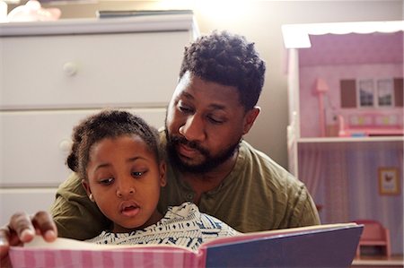 simsearch:614-06623416,k - Father reading to daughter Stock Photo - Premium Royalty-Free, Code: 614-08881220