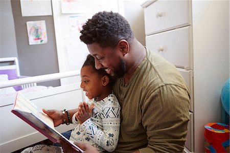 simsearch:614-06623416,k - Father reading to daughter Stock Photo - Premium Royalty-Free, Code: 614-08881221
