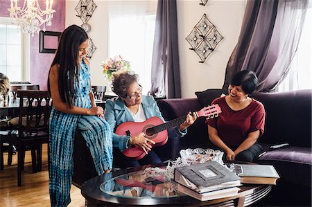 simsearch:614-07768068,k - Grandmother playing guitar for family Stock Photo - Premium Royalty-Free, Code: 614-08926645