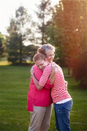 simsearch:614-07735242,k - Portrait of mother and adult daughter, hugging Stock Photo - Premium Royalty-Free, Code: 614-08946672