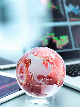 simsearch:700-05452103,k - Globe with digital tablet and laptop showing international business trade Stock Photo - Premium Royalty-Free, Code: 614-08982749