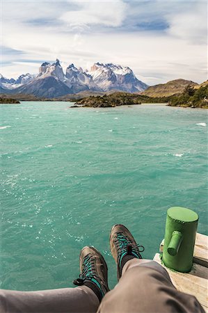 simsearch:614-07240106,k - Male hiker's personal perspective over Grey Lake and Cuernos del Paine, Torres del Paine national park, Chile Stock Photo - Premium Royalty-Free, Code: 614-09017614