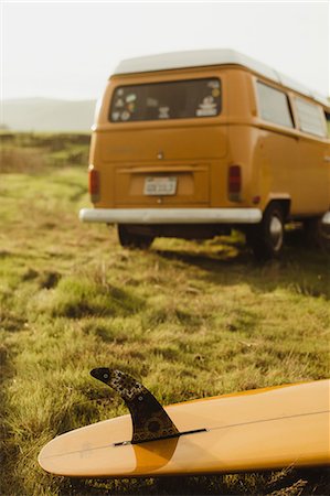 enroute - Yellow surfboard and vintage recreational van on roadside, Exeter, California, USA Stock Photo - Premium Royalty-Free, Code: 614-09026447