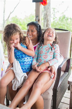 Mother laughing with daughters Stock Photo - Premium Royalty-Free, Code: 614-09027196