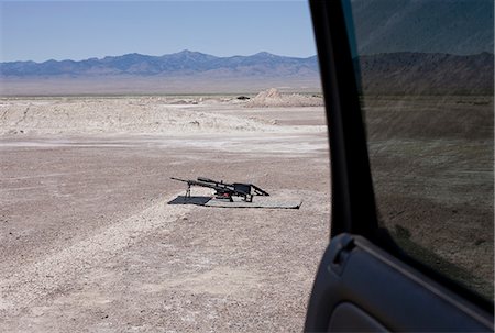View from car door of semi automatic weapon at firing range at Wendover, Utah, USA Stock Photo - Premium Royalty-Free, Code: 614-09039091