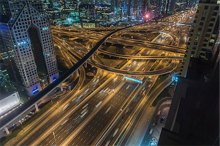 High angle cityscape with city highway at night, Dubai, United Arab Emirates Stock Photo - Premium Royalty-Free, Code: 614-09056571