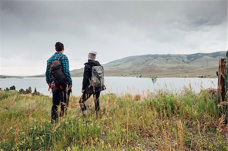 simsearch:649-08086253,k - Couple near Dillon Reservoir, looking at view, Silverthorne, Colorado, USA Stock Photo - Premium Royalty-Free, Code: 614-09127197