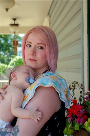 sucking - Woman with baby boy in arms Stock Photo - Premium Royalty-Free, Code: 614-09127457