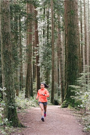 simsearch:649-07437947,k - Woman running in forest, Vancouver, Canada Stock Photo - Premium Royalty-Free, Code: 614-09147804