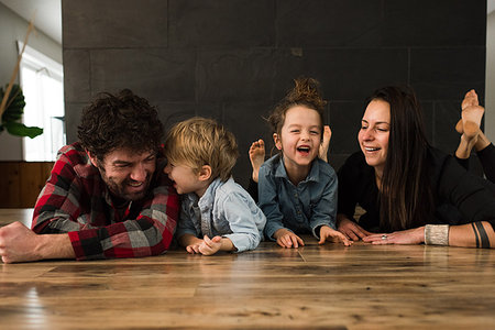 simsearch:614-05650637,k - Parents and children playing on floor Stock Photo - Premium Royalty-Free, Code: 614-09178510