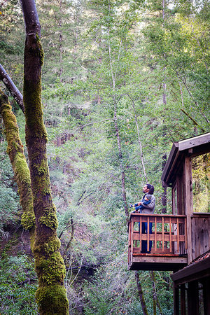 simsearch:614-07031844,k - Father with baby son on balcony of stilted wooden house in forest, Cazadero, California, USA Stock Photo - Premium Royalty-Free, Code: 614-09183061