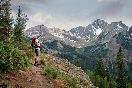 simsearch:614-07240106,k - Hiker on mountain peak, Mount Sneffels, Ouray, Colorado, USA Stock Photo - Premium Royalty-Free, Code: 614-09183175