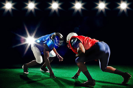 simsearch:6113-08698170,k - Two american footballers playing head to head Stock Photo - Premium Royalty-Free, Code: 614-09210355