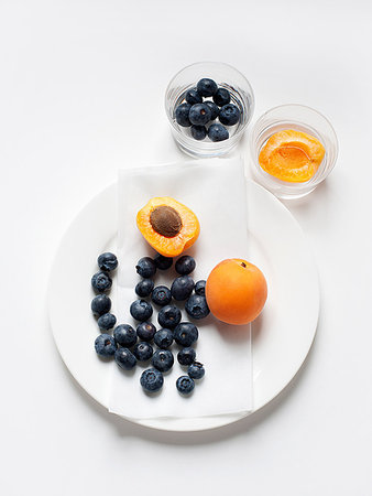 simsearch:614-01088098,k - Still life with plate of apricots and blueberries Stock Photo - Premium Royalty-Free, Code: 614-09210454