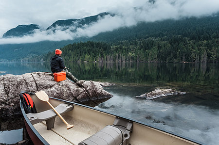 fishing lake canada - Man fishing from rocks, Buntzen Lake, British Columbia, Canada Stock Photo - Premium Royalty-Free, Code: 614-09210963