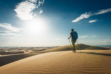 Man hiking in Glamis sand dunes, California, USA Stock Photo - Premium Royalty-Free, Code: 614-09211293