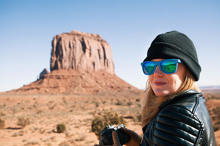 simsearch:614-07486939,k - Portrait of woman in blue sunglasses, Monument Valley, Utah, USA Stock Photo - Premium Royalty-Free, Code: 614-09211720