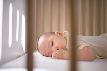 simsearch:614-07031844,k - Baby boy sleeping in cot Stock Photo - Premium Royalty-Free, Code: 614-09211989
