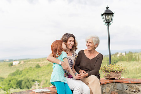 simsearch:6113-07242309,k - Girl on garden patio with mother and grandmother Stock Photo - Premium Royalty-Free, Code: 614-09245248
