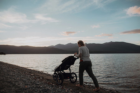 simsearch:614-07735242,k - Mother with baby in pram walking on beach, Te Anau, Southland, New Zealand Stock Photo - Premium Royalty-Free, Code: 614-09259232