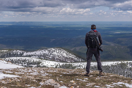 simsearch:614-06625125,k - Hiker on top of mountain range, Calgary, Canada Stock Photo - Premium Royalty-Free, Code: 614-09276416