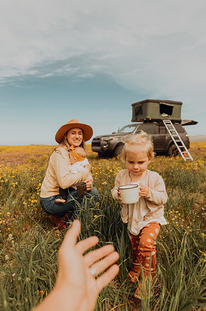 Mother with daughters on road trip in countryside Stock Photo - Premium Royalty-Free, Code: 614-09270312