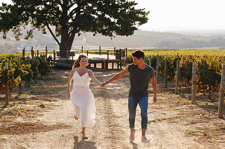 simsearch:614-06898128,k - Couple walking along vineyard, Cape Town, South Africa Stock Photo - Premium Royalty-Free, Code: 614-09270638