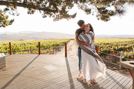 simsearch:614-06898128,k - Couple hugging in vineyard, Cape Town, South Africa Stock Photo - Premium Royalty-Free, Code: 614-09270639