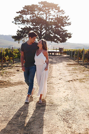 simsearch:614-06898128,k - Couple walking along vineyard, Cape Town, South Africa Stock Photo - Premium Royalty-Free, Code: 614-09270657
