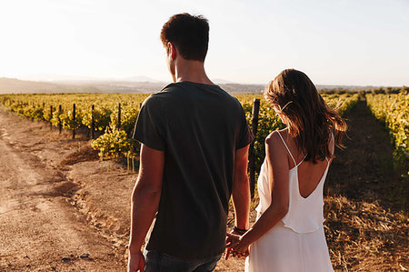 simsearch:614-06898128,k - Couple walking along vineyard, Cape Town, South Africa Stock Photo - Premium Royalty-Free, Code: 614-09270674