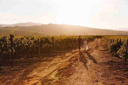 simsearch:614-06898128,k - Couple walking along vineyard, Cape Town, South Africa Stock Photo - Premium Royalty-Free, Code: 614-09270673