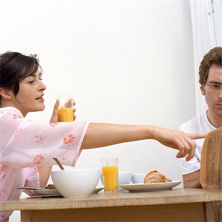 simsearch:6108-06166047,k - Couple at breakfast table Stock Photo - Premium Royalty-Free, Code: 614-00594476